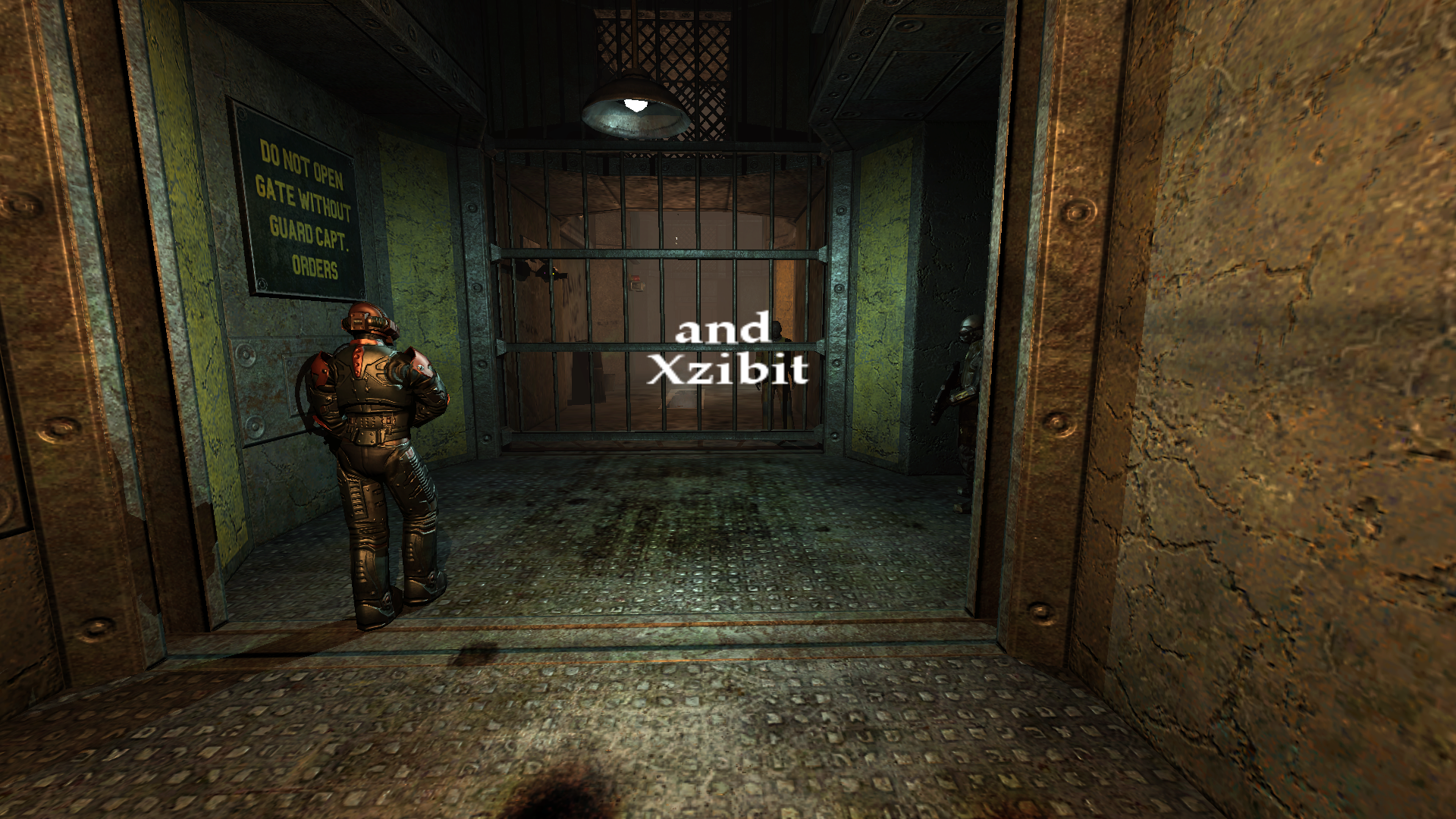 First person scene of Riddick being walked into the cell block, with opening credits on the center of the screen that read 'and Xzibit'.